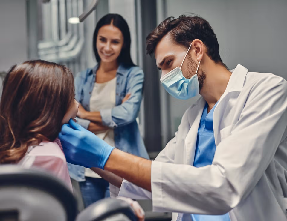 Child receiving cosmetic pediatric dental care